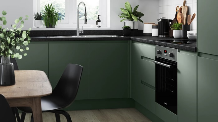 Madison Reed Green Kitchen with an integrated oven