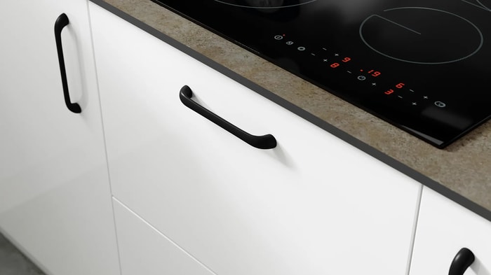 Black handle on a Melrose White Kitchen unit